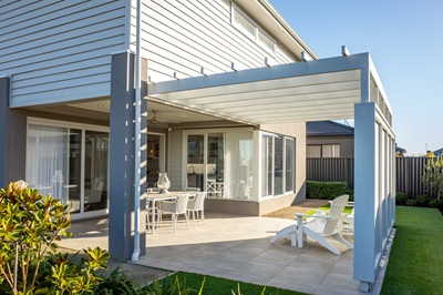 Modern patio with a pergola and outdoor seating area